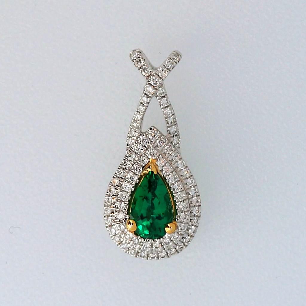 14k White Gold Pendant with a .31ct Emerald and .16ct diamonds