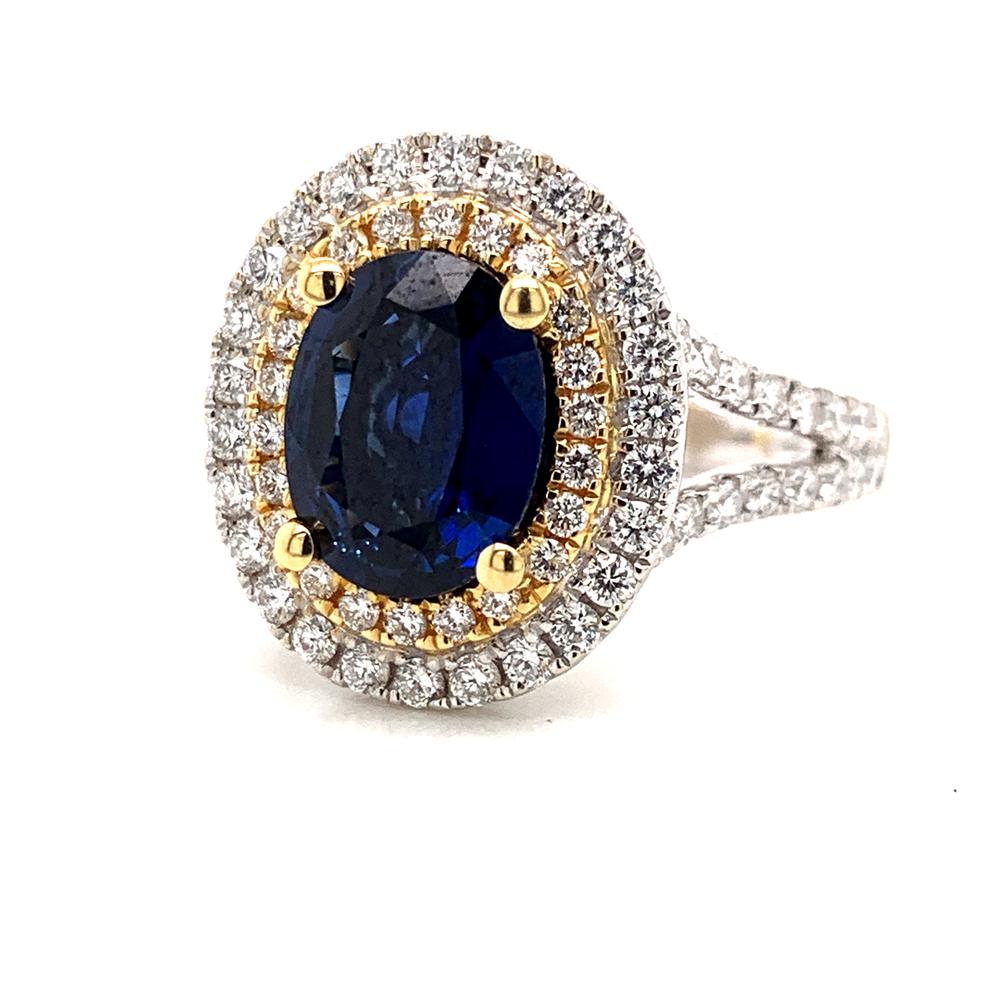 18k two-tone ring with a CDC certified unheated Ceylon sapphire