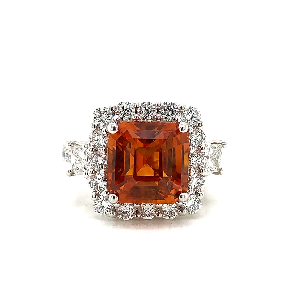 18kt White Gold gold ring with a GIA certified orange sapphire