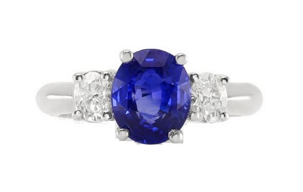 18kt White Gold gold ring with a GIA certified unheated sapphire center stone.
