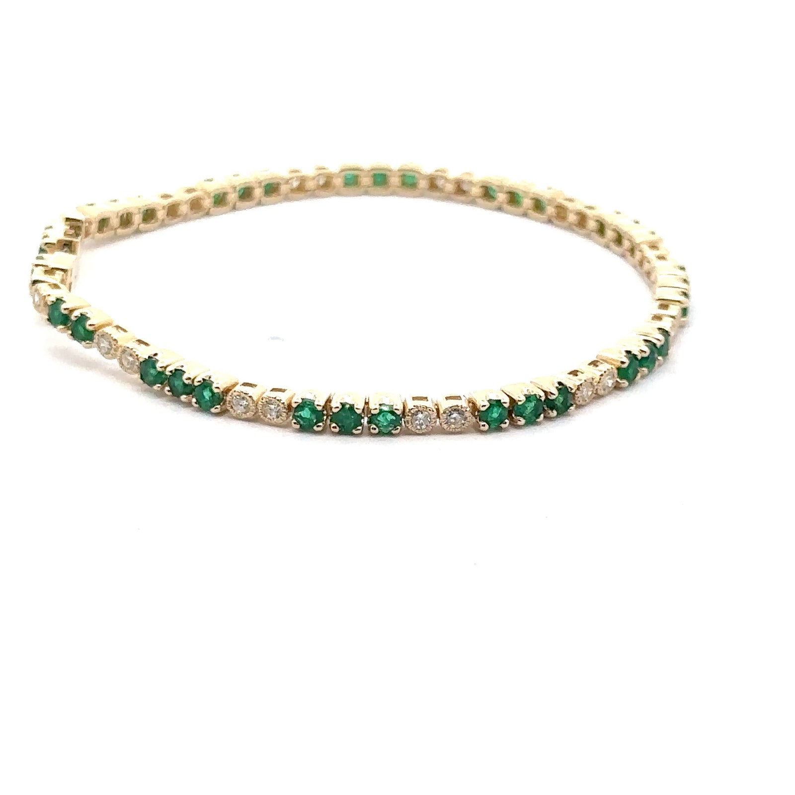 14k Yellow and White Gold Tennis Bracelet with Emeralds and Diamonds