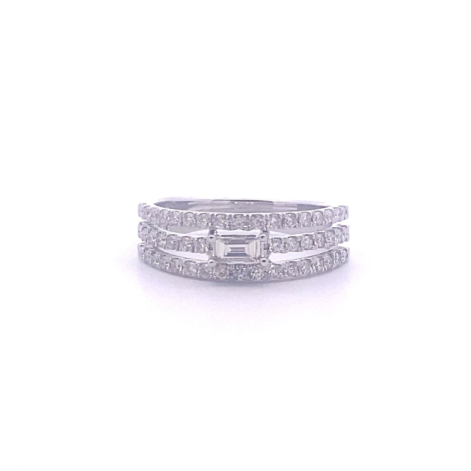 14k White Gold Ring with a Baguette Cut Diamond and Round Diamonds