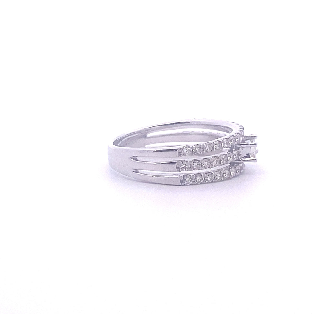 14k White Gold Ring with a Baguette Cut Diamond and Round Diamonds