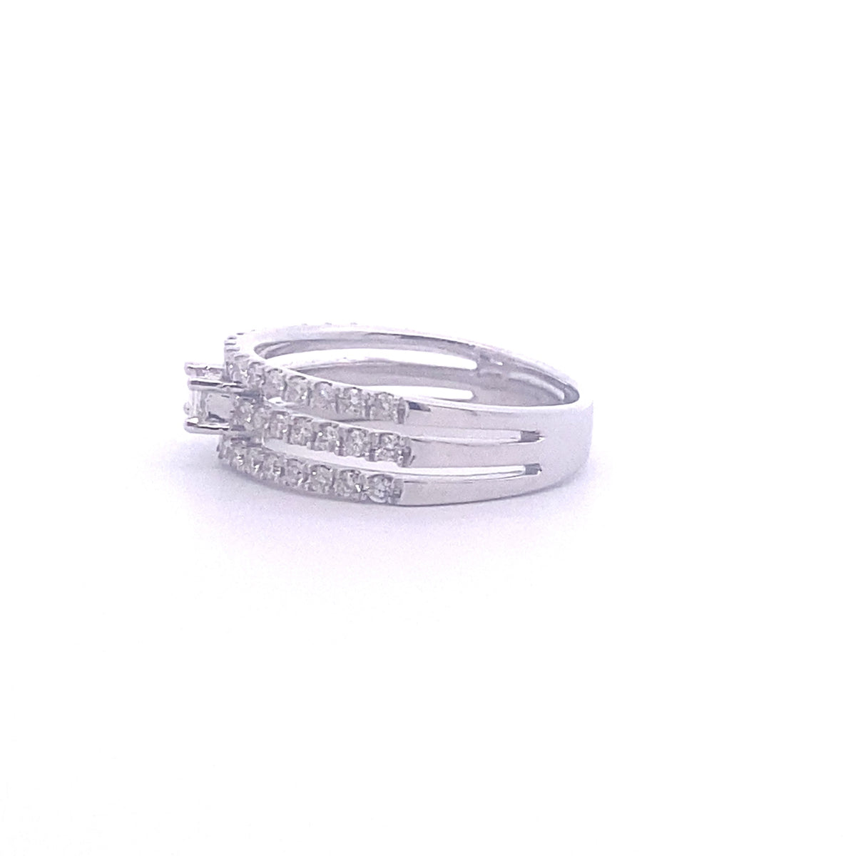 14k White Gold Ring with a Baguette Cut Diamond and Round Diamonds