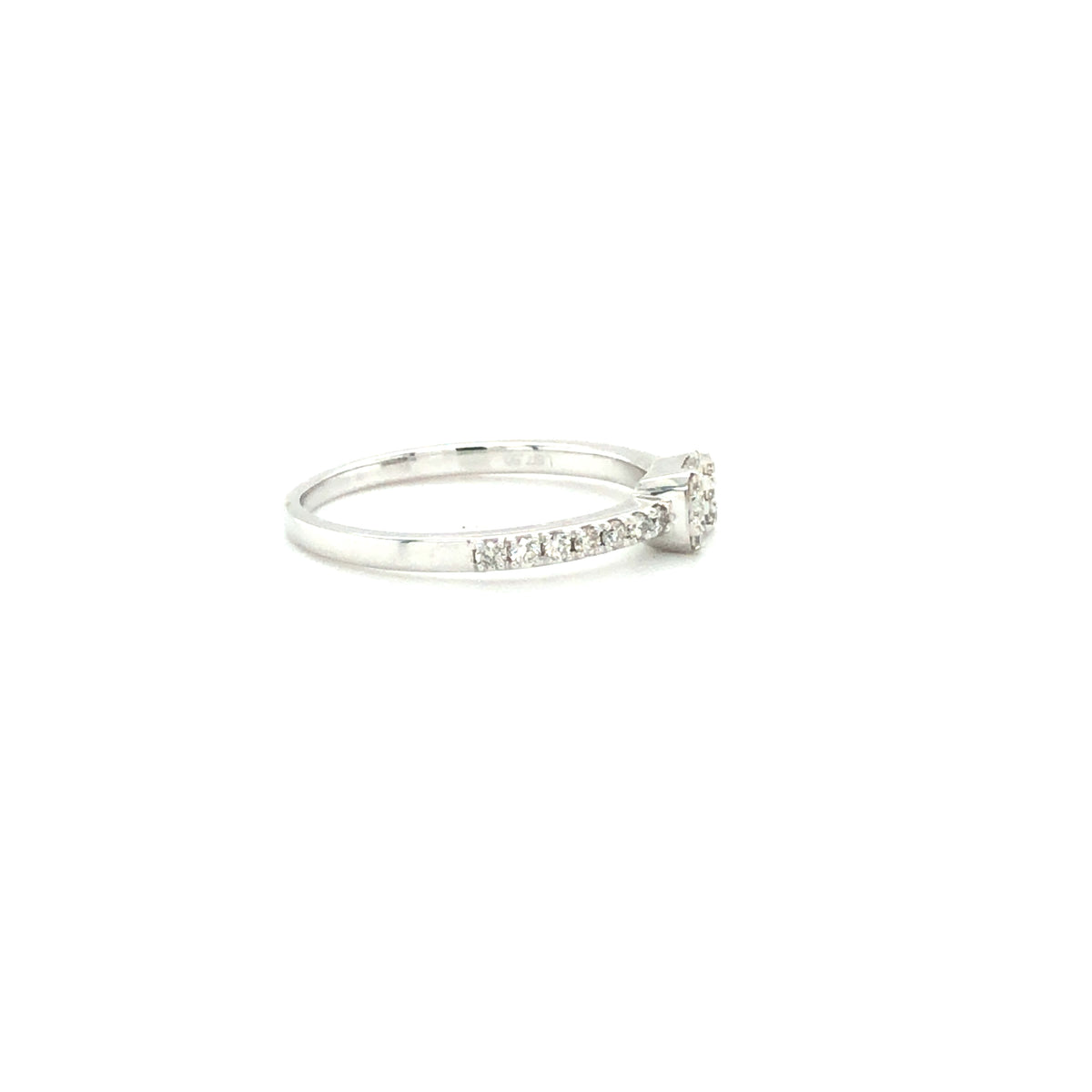 14k White Gold Ring with a Baguette and Round Cut Diamonds
