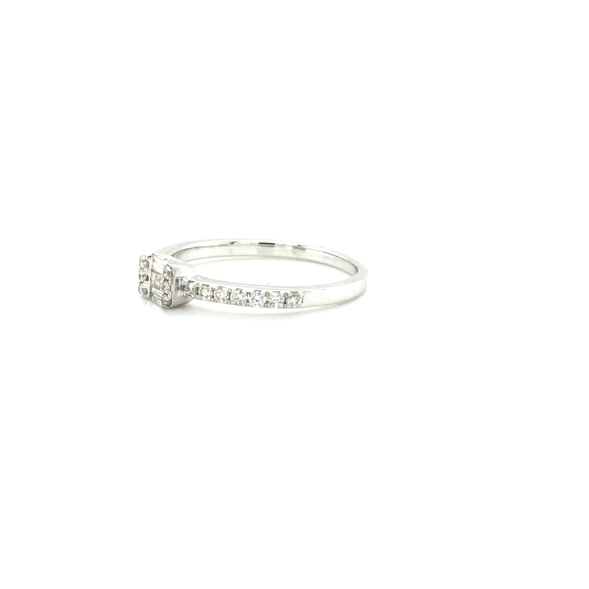 14k White Gold Ring with a Baguette and Round Cut Diamonds