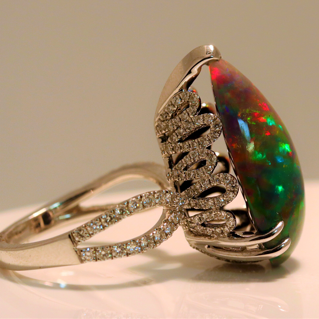 18k White Gold Ring with 7.30ct Opal and .94ct diamonds