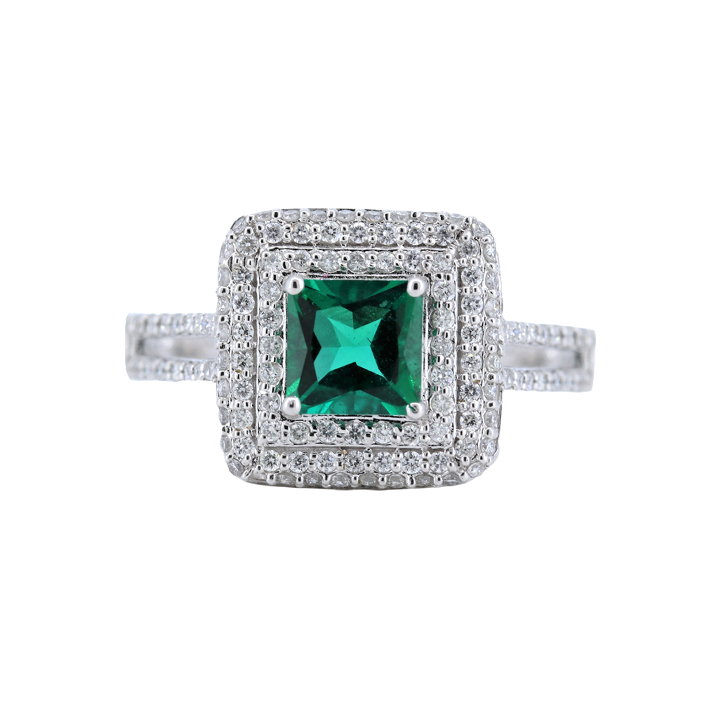 Emerald Ring with 3 rows of Diamonds in Halo set in 14kt White Gold
