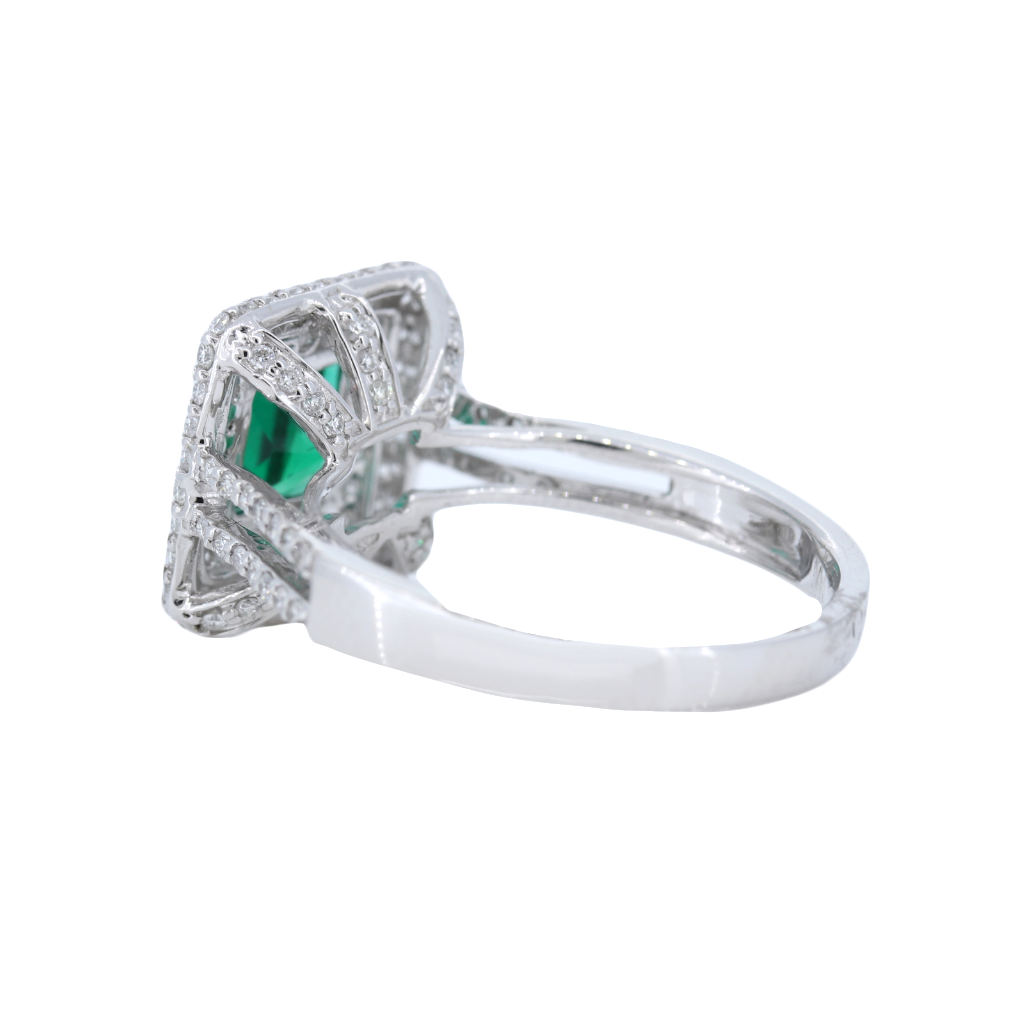 Emerald Ring with 3 rows of Diamonds in Halo set in 14kt White Gold