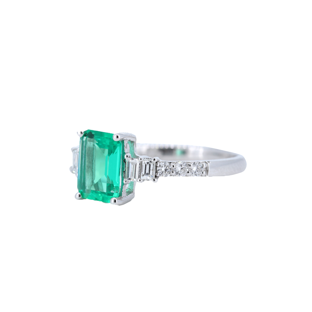 1.10 Carat Cushion Cut Emerald Ring with diamonds in 14kt White Gold