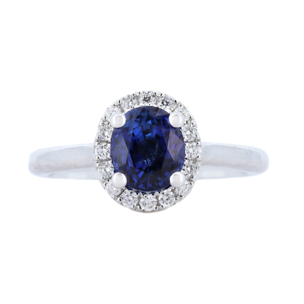 Oval Sapphire And Diamond Halo Ring In 14Kt White Gold