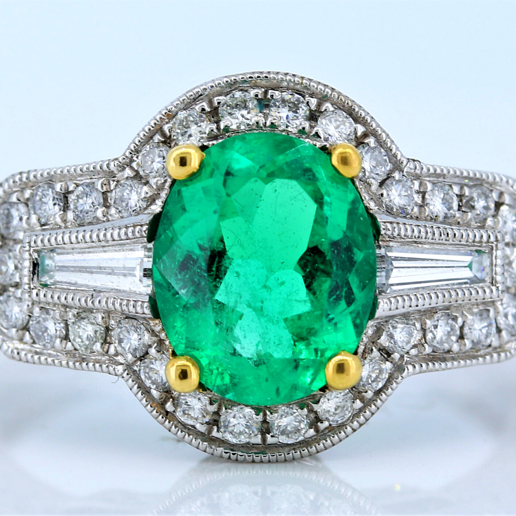 18k White Gold Ring with a 1.39ct Emerald and diamonds