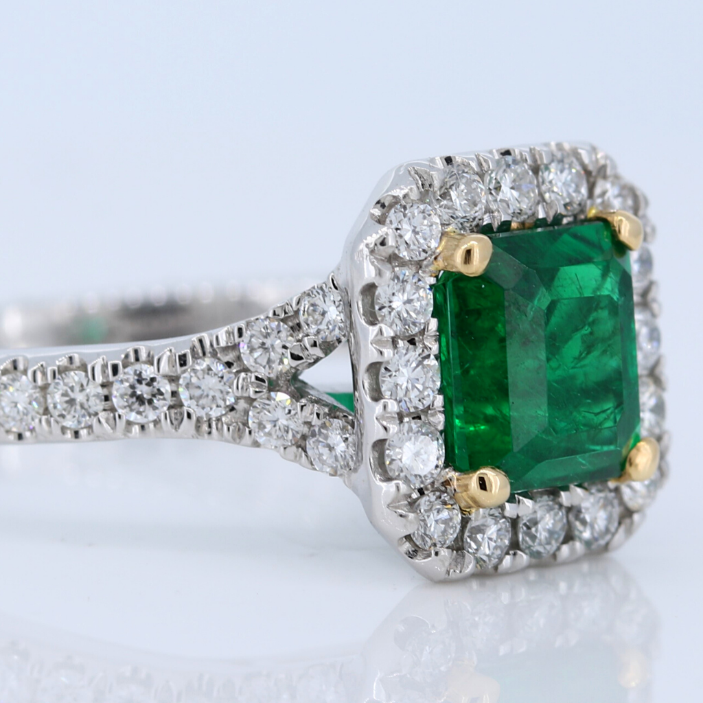 Platinum Ring with 1.38ct Emerald and .53ct diamonds