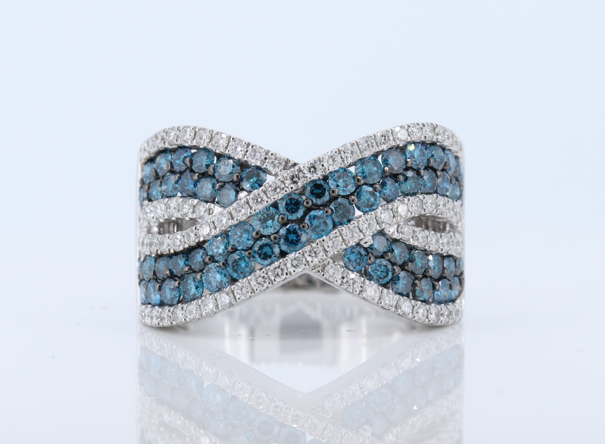 Beautiful Criss-Cross Blue and White Diamond Ring in Gold