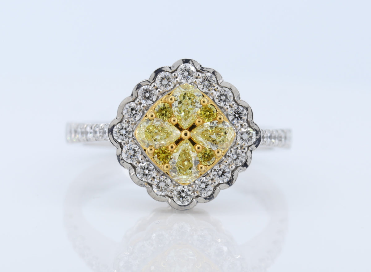 Stunning Yellow Diamond Ring set in 18K White Gold.