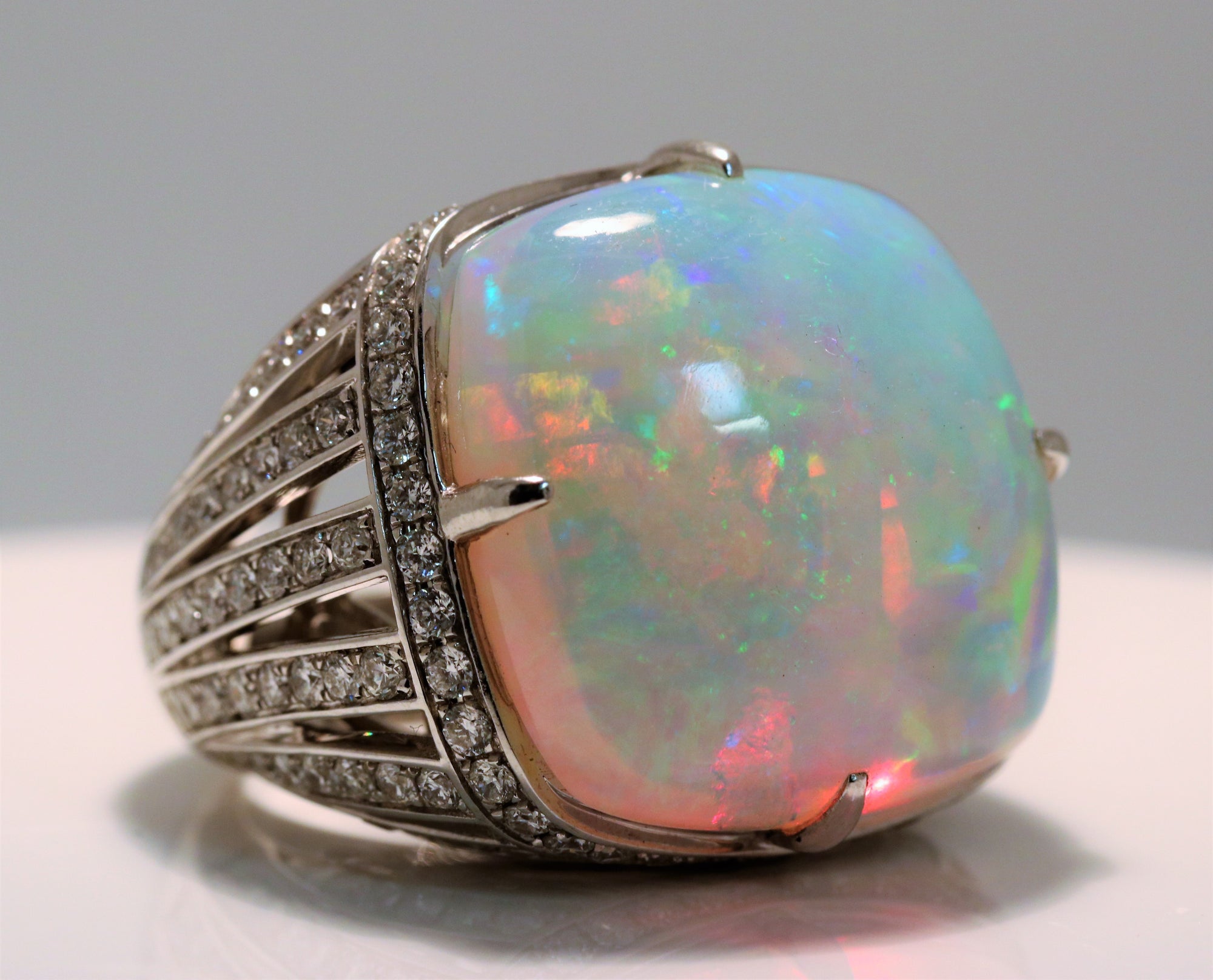 Cushion Cabochon Opal Ring With Diamond Halo