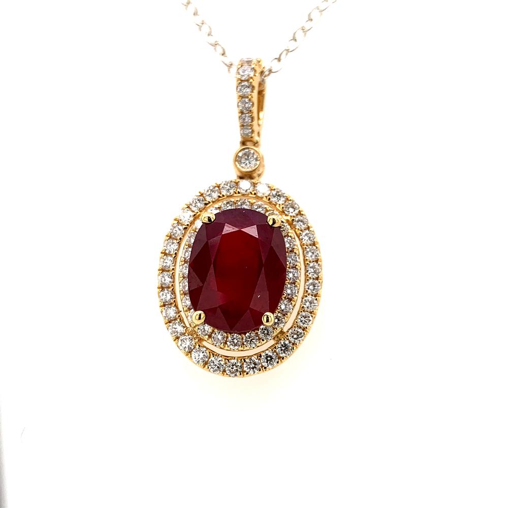 18ky Mozambique ruby pendant with a Christian Dunaigre report