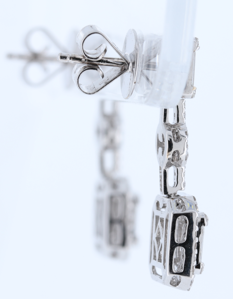 18Kt Ladies Dangling Diamond Earring Total Weight 1.19Cts In White Gold With Baguette And Round Cut Diamonds.