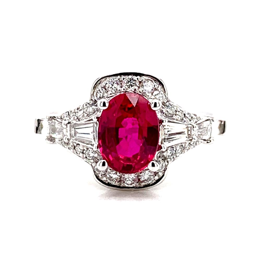 18kt White Gold gold ring with an unheated ruby center stone.