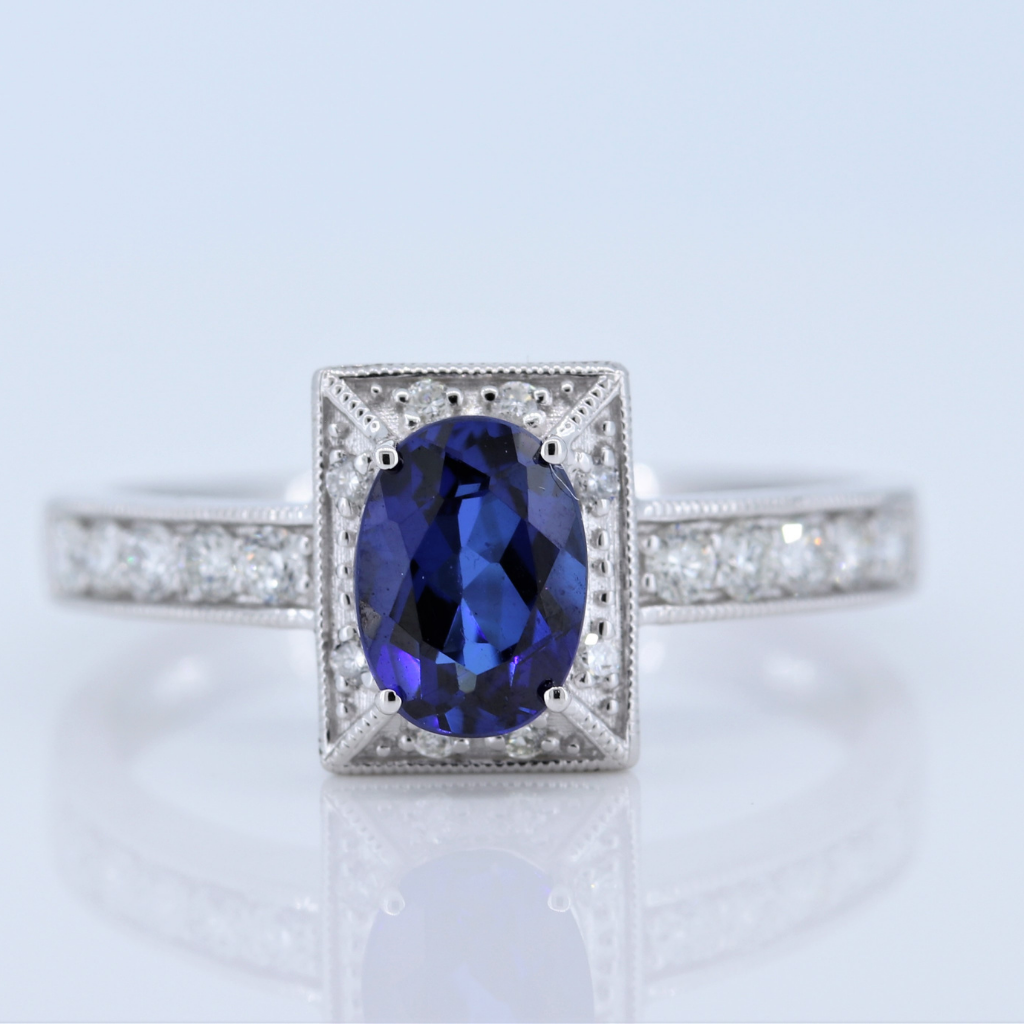 1 Carat Sapphire Ring w Diamond halo in 14kt White Gold