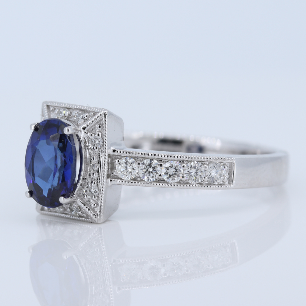 1 Carat Sapphire Ring w Diamond halo in 14kt White Gold