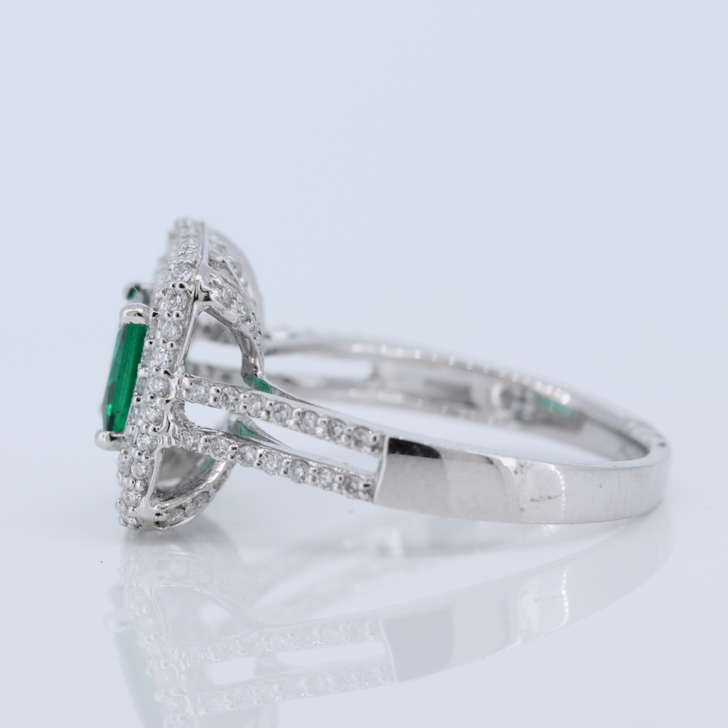 Emerald Ring with 3 rows of Diamonds in Halo set in 14kt White Gold