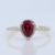 Pear Ruby and Diamond Halo 14kt Yellow Gold Ring