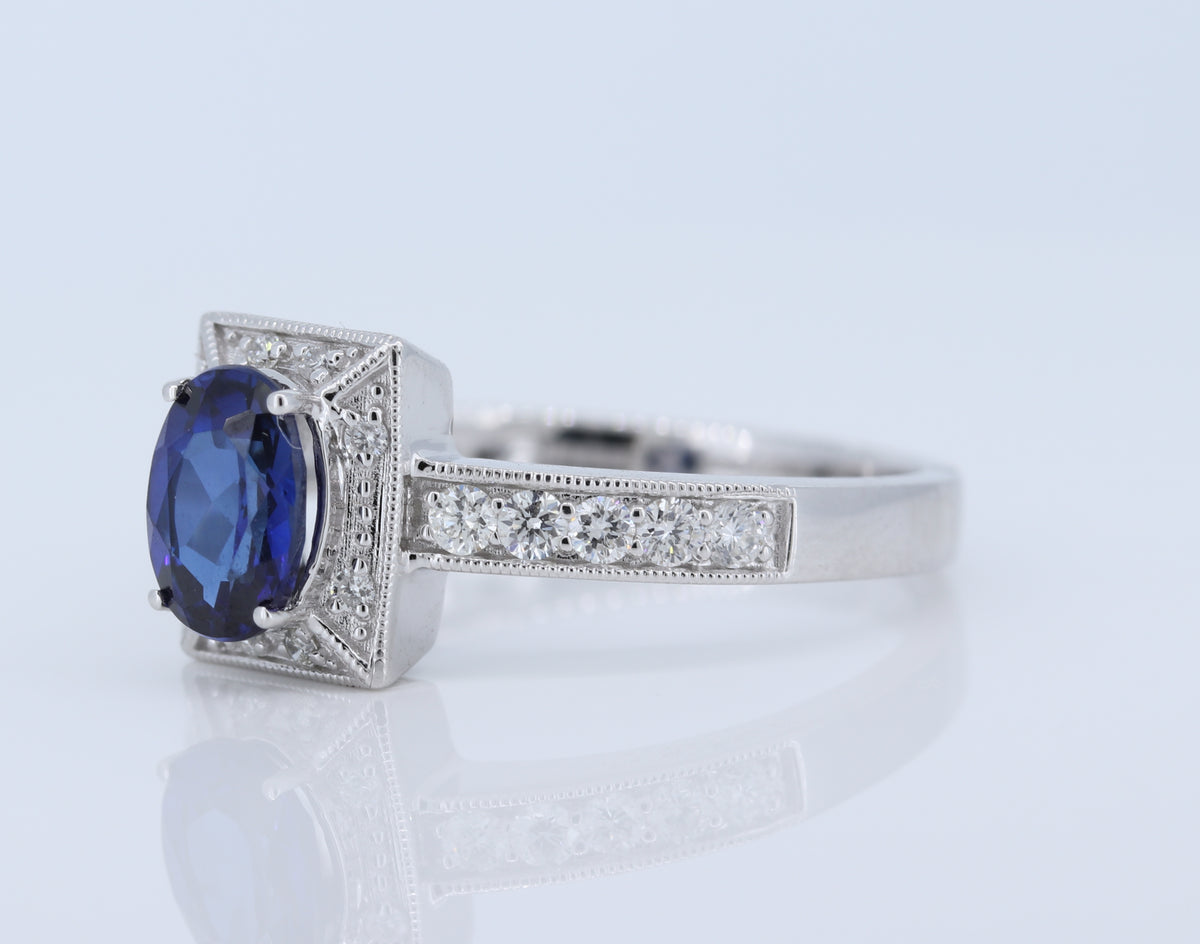 1 Carat Sapphire Ring w Diamond halo in 14kt White Gold