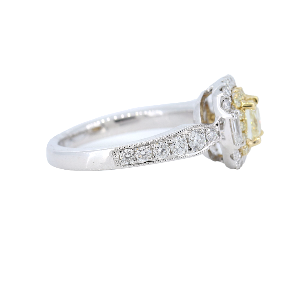 18Kt. White Gold Ring with a cushion-cut fancy yellow diamond, double frame, 0.83ct.