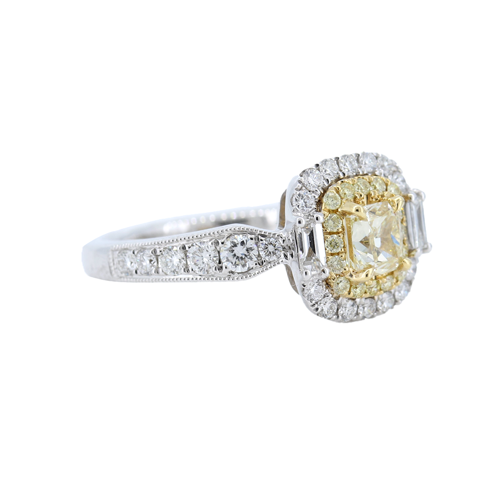 18Kt. White Gold Ring with a cushion-cut fancy yellow diamond, double frame, 0.83ct.