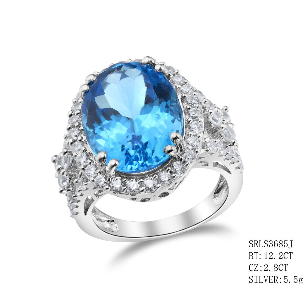 Sterling Silver Blue Topaz Ring Featuring With Oval Cut In The Center In 8 Prong Setting Surround By C.Z Followed By C.Z  On The Band On Each Side, Blue Topaz - Blue Topaz - 12.2ctw CZ - 2.8ctw