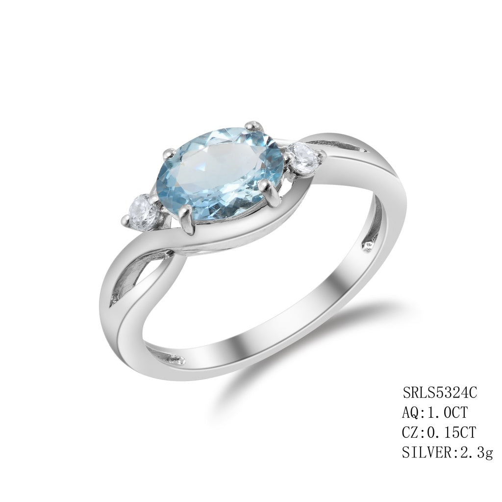 Sterling Silver Oval Cut Aqua Facing East West Direction In 4 Prong Setting Followed By 1C.Z On Each Side, Aquamarine - 1.00Ctw C.Z - 0.15Ctw